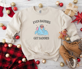 a sweater that says even baddies get saddles on it