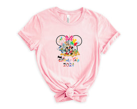 a pink tshirt with mickey mouse and friends on it